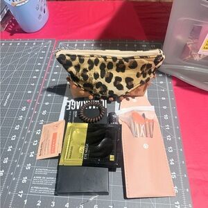 Bundle of stuff. Handcrafted makeup bag with name brand makeup.